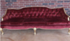 Red Velvet Couch rental in Nashville, TN