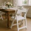 White Padded Resin Folding Chair rental in Chicago, IL