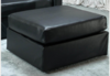 Black leather ottoman rental in Los Angeles, CA