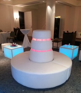 Circular White Vinyl Couch with Lighted Pillar rental Los Angeles, CA