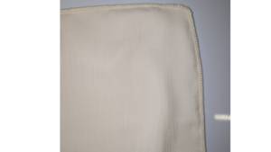 Ivory Textured Poly Napkin 20x20 rental Greater Northern Michigan