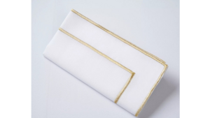 White & Gold Stitch Napkin rental Greater Northern Michigan