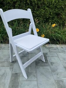 Garden White Resin Folding Chair w/ White Padded rental Long Island, NY